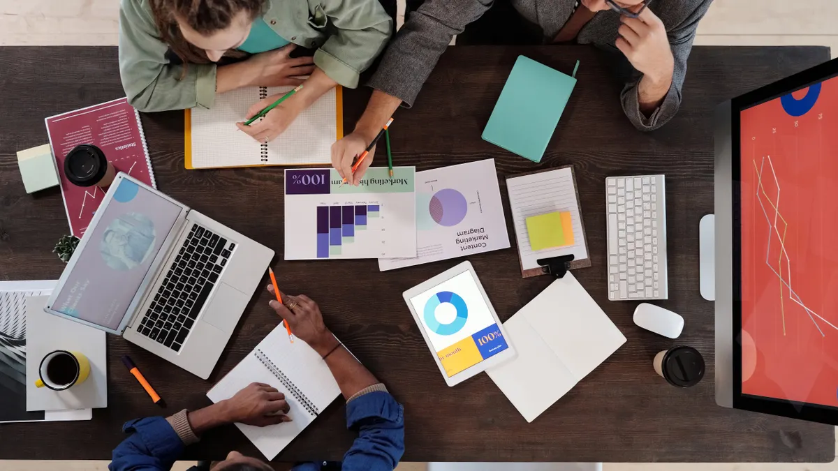 Best SaaS tools for email marketing teams Best SaaS tools for email marketing teams — Team Having a Meeting