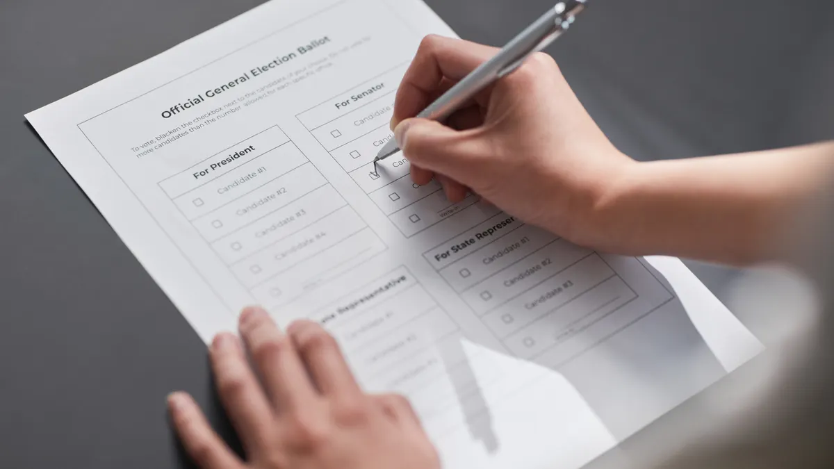person checking boxes on a printed intake checklist