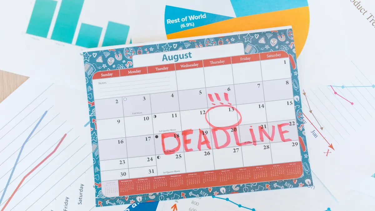 Desk calendar marked with a deadline stamp