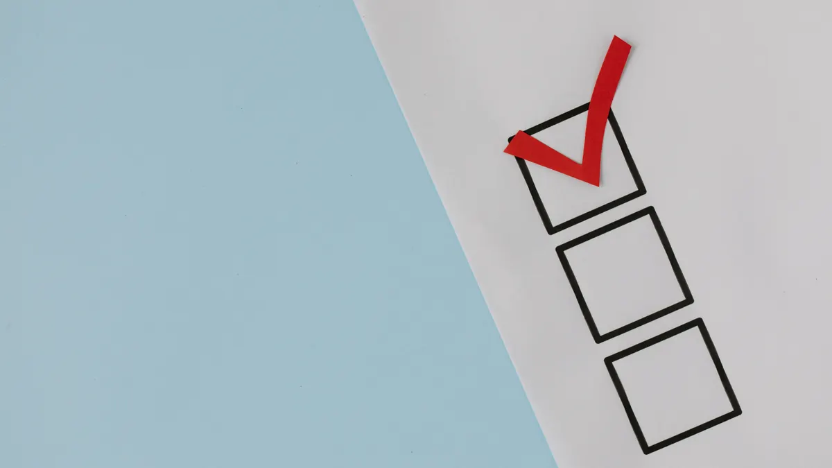 paper checklist with one red checkmark
